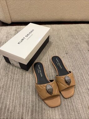 Kurt Geiger Camel Quilted Slide Mules with Ornate Silver Medallion